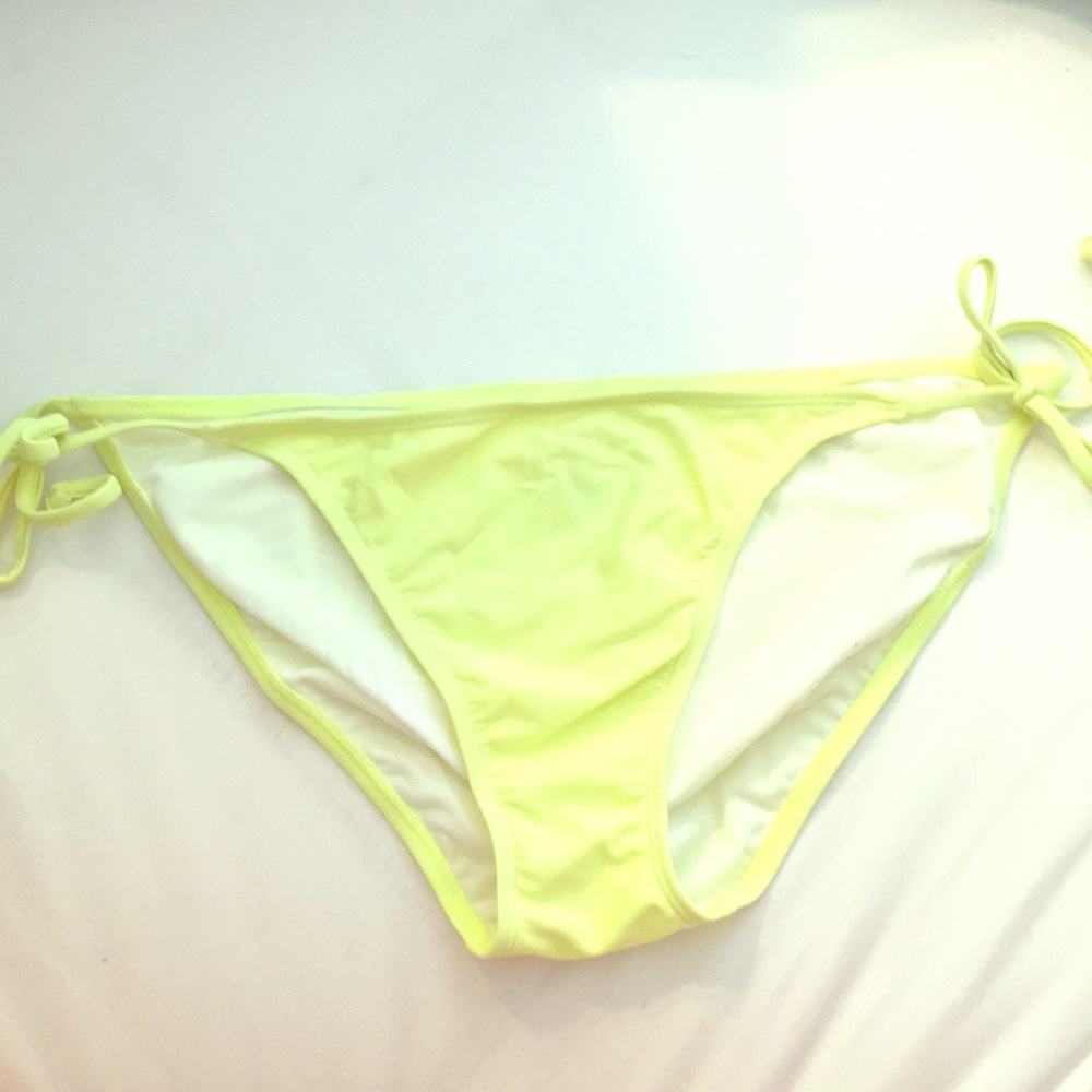 Yellow bikini bottom.